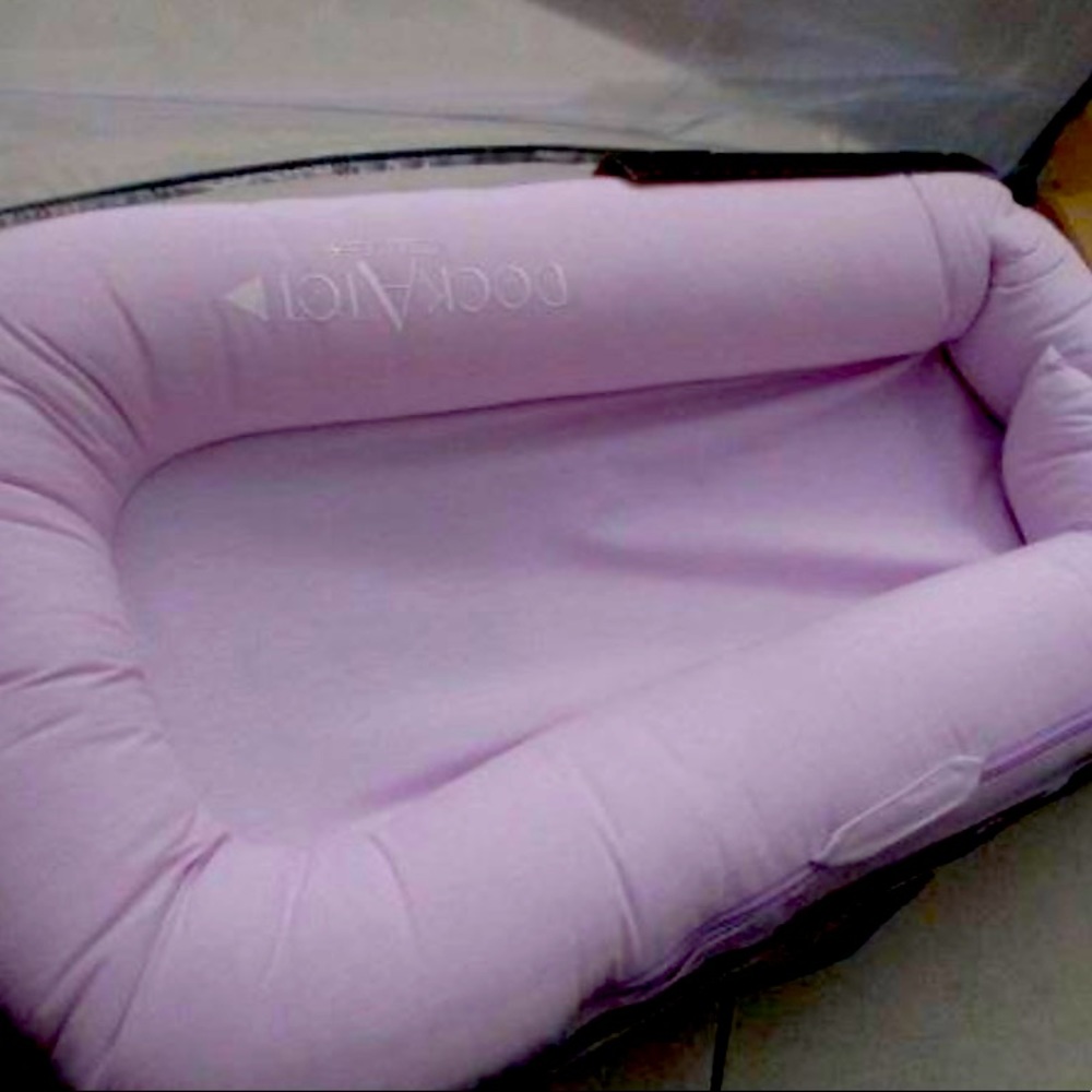 Pink Dock a Tot. Brand new in package.